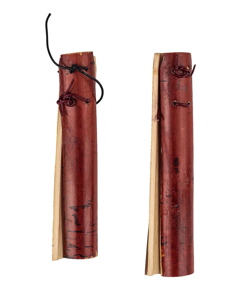 Pair of split wooden clappers with reddish outer surfaces and looped cords